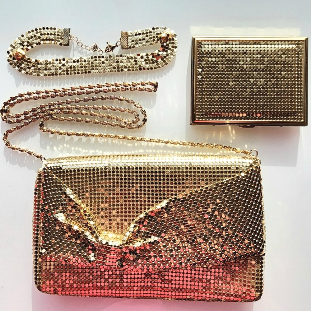 Gold chainmail evening bag with matching choker necklace and cigarette case.